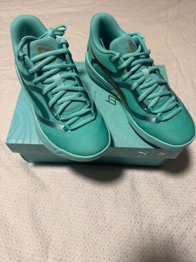 Puma Women's Teal Low-Top Sneakers with Gold Accents